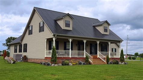 blue house brown metal roof|brown roof house color scheme.